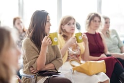 ladies attending event drinking tea