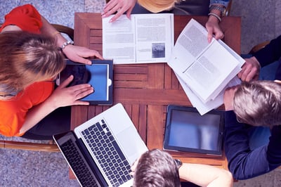 students working together at desk